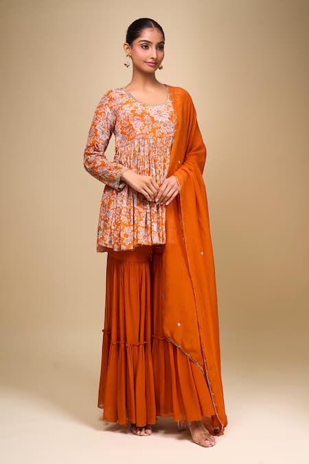 Buy Samyukta Singhania Orange Crepe Round Neck Floral Peplum Kurta And Gharara Set Online at Aza Fashions Buy_Samyukta Singhania_Orange Crepe Round Neck Floral Peplum Kurta And Gharara Set _Online_at_Aza_Fashions