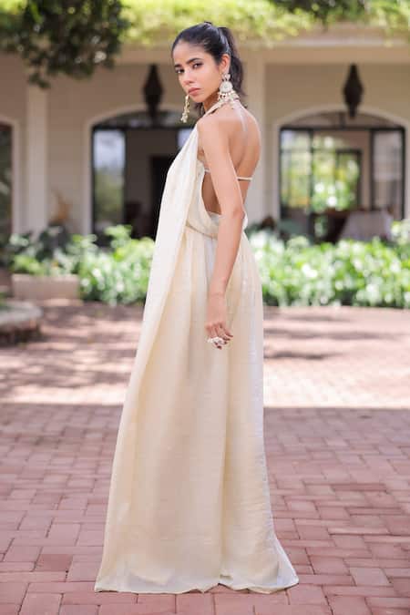 Foram Patel_Cream Organza Halter Neck Designer Soft Jumpsuit_at_Aza_Fashions
