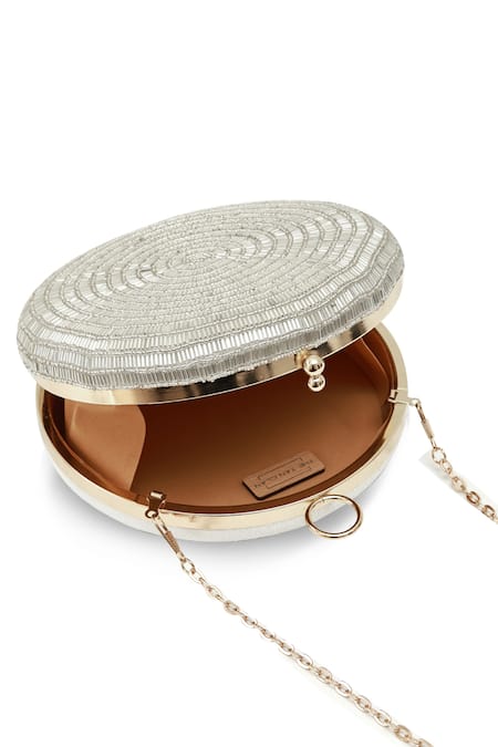 Shop_The Tan Clan_Silver Glitz Round Clutch _Online_at_Aza_Fashions