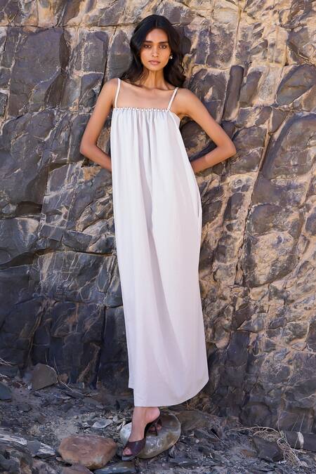 Dash And Dot Off White Polyester Beads Off-shoulder Pearl Poplin Midi Dress at Aza Fashions Dash And Dot_Off White Polyester Beads Off-shoulder Pearl Poplin Midi Dress _at_Aza_Fashions