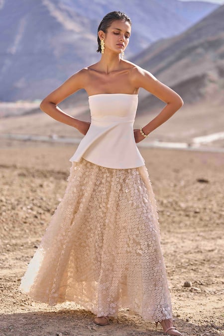 Dash And Dot Ivory Viscose, Polyester Sequins Open Neck Peplum Top And Floral Skirt at Aza Fashions Dash And Dot_Ivory Viscose, Polyester Sequins Open Neck Peplum Top And Floral Skirt_at_Aza_Fashions