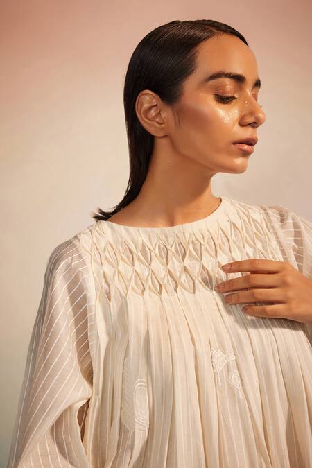 Ahmev_Ivory Chanderi Cotton Embroidery Round Neck Musubi Smocking Dress _at_Aza_Fashions