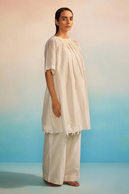 Shop Ahmev Ivory Chanderi, Cotton Embroidery Round Neck Box Pleat Applique Kurta Set Online at Aza Fashions Shop_Ahmev_Ivory Chanderi, Cotton Embroidery Round Neck Box Pleat Applique Kurta Set _Online_at_Aza_Fashions