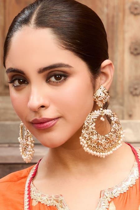 Shop Queens Jewels White Pearls Royal Jadau Chaandbali Earrings at Aza Fashions Shop_Queens Jewels_White Pearls Royal Jadau Chaandbali Earrings _at_Aza_Fashions
