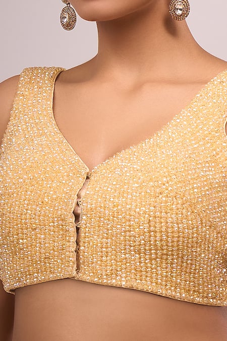 Buy Samyukta Singhania Gold Silk Crystals Round Neck Padded Hand Embroidered Blouse Online at Aza Fashions Buy_Samyukta Singhania_Gold Silk Crystals Round Neck Padded Hand Embroidered Blouse _Online_at_Aza_Fashions
