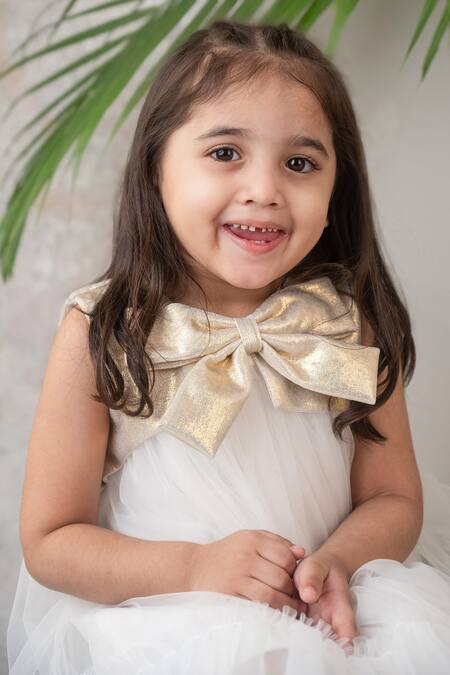 Shop Label Neeti Gold Net, Lurex, Lining Cotton Plain Layered Bow Dress Online at Aza Fashions Shop_Label Neeti_Gold Net, Lurex, Lining Cotton Plain Layered Bow Dress _Online_at_Aza_Fashions