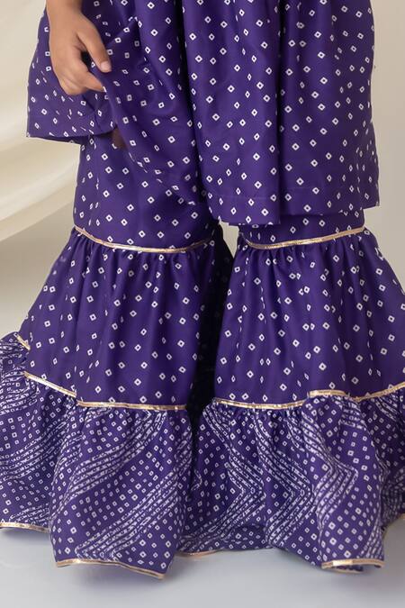 Buy Label Neeti Purple Muslin, Cotton Embroidery, Ruffles Bandhani Print Top With Sharara Online at Aza Fashions Buy_Label Neeti_Purple Muslin, Cotton Embroidery, Ruffles Bandhani Print Top With Sharara _Online_at_Aza_Fashions