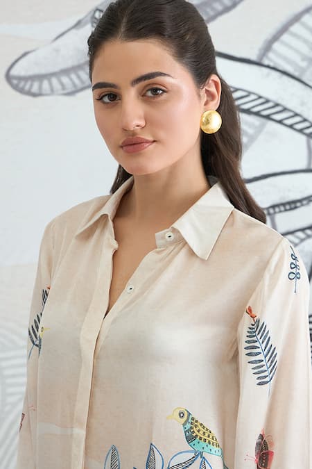 Shivani Bhargava Ivory Silk Satin Collared Jungle Shirt Dress Online at Aza Fashions Shivani Bhargava_Ivory Silk Satin Collared Jungle Shirt Dress _Online_at_Aza_Fashions