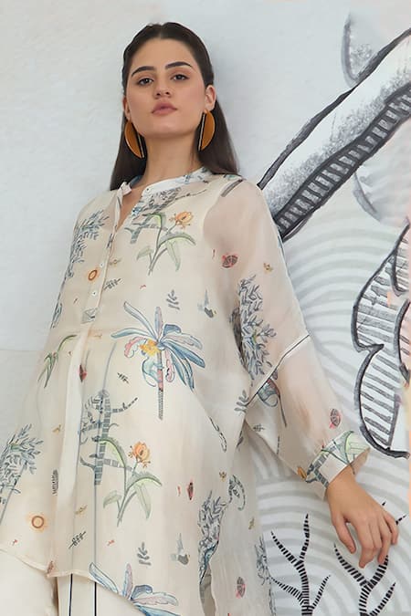 Shivani Bhargava Ivory Organza, Satin Jungle Kimono Tunic With Blue Piping Pants at Aza Fashions Shivani Bhargava_Ivory Organza, Satin Jungle Kimono Tunic With Blue Piping Pants _at_Aza_Fashions