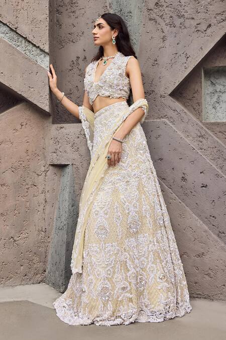 Shop Mehul Gupta Ivory Net, Lycra Embroidery V-neck Lehenga Set Online at Aza Fashions Shop_Mehul Gupta_Ivory Net, Lycra Embroidery V-neck Lehenga Set _Online_at_Aza_Fashions