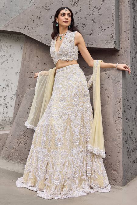 Mehul Gupta Ivory Net, Lycra Embroidery V-neck Lehenga Set at Aza Fashions Mehul Gupta_Ivory Net, Lycra Embroidery V-neck Lehenga Set _at_Aza_Fashions
