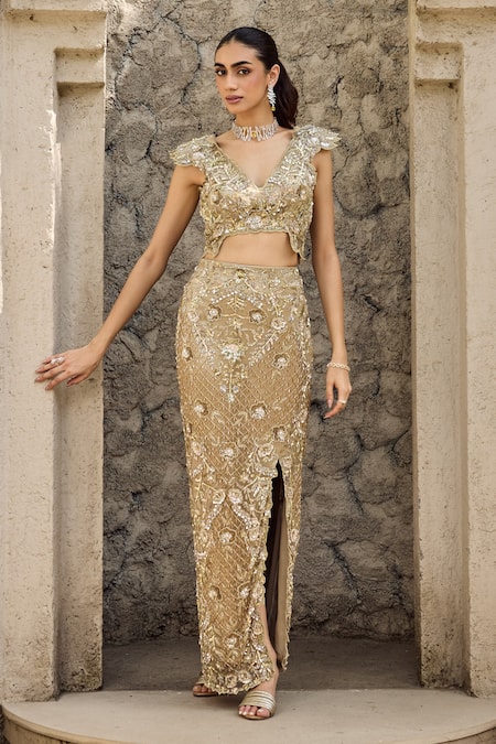 Mehul Gupta_Gold Net Embroidery, Sequins V-neck Hand Skirt Set _at_Aza_Fashions