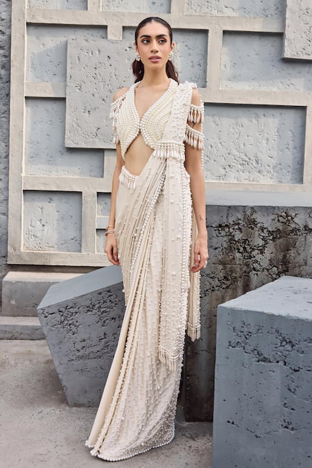 Mehul Gupta_Ivory Satin Pearls, Tassels V-neck Hand Embroidered Pre-draped Saree Set _at_Aza_Fashions