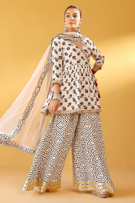Palak & Mehak_Cream Crepe Tassels V-neck Floral Angarkha Set _Online_at_Aza_Fashions