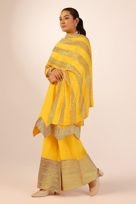 Palak & Mehak_Yellow Chanderi Zari Round Neck Kurta Sharara Set _at_Aza_Fashions