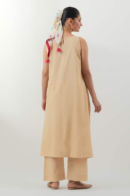 Shop Vinusto Beige Cotton Embroidery Round Neck Floral Kurta Pant Set at Aza Fashions Shop_Vinusto_Beige Cotton Embroidery Round Neck Floral Kurta Pant Set _at_Aza_Fashions