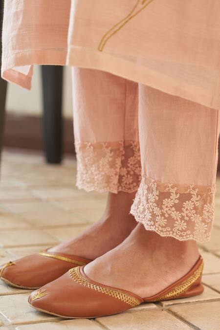 Vaayu_Peach Muslin, Cotton Embroidery, Lace, Tassels Magnolia Applique Kurta Set _Online_at_Aza_Fashions
