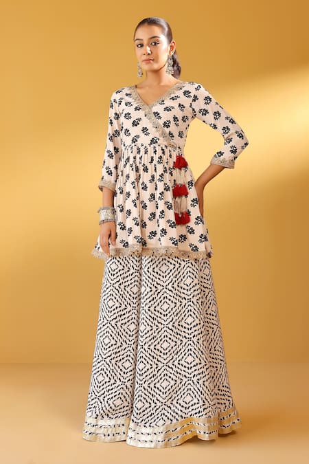 Palak & Mehak_Cream Crepe Tassels V-neck Floral Angarkha Set _at_Aza_Fashions