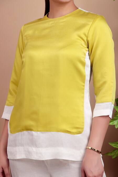 Nidhi Kejriwal_Lime Linen, Modal Round Neck Lemon Yellow Designer Top And Pant Set _at_Aza_Fashions