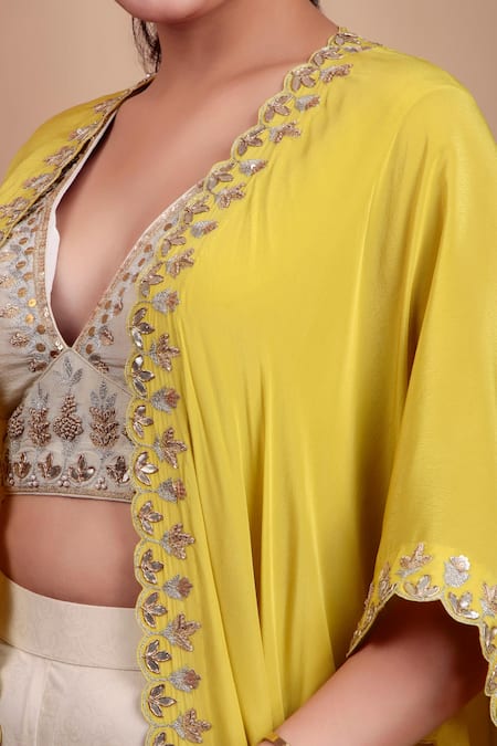 Shop Nidhi Kejriwal Off White Georgette, Crepe Sequins, Embroidery Blouse And Palazzo Set With Cape Shop_Nidhi Kejriwal_Off White Georgette, Crepe Sequins, Embroidery Blouse And Palazzo Set With Cape