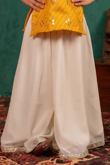 JILMIL DREAMWEAR Yellow Cotton Mirrors Work Top And Palazzo Set Online at Aza Fashions JILMIL DREAMWEAR_Yellow Cotton Mirrors Work Top And Palazzo Set _Online_at_Aza_Fashions