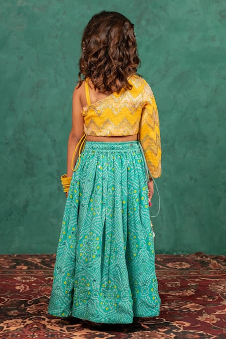 Shop JILMIL DREAMWEAR Yellow Brocade Tassels Bandhani Top And Lehenga Set at Aza Fashions Shop_JILMIL DREAMWEAR_Yellow Brocade Tassels Bandhani Top And Lehenga Set _at_Aza_Fashions