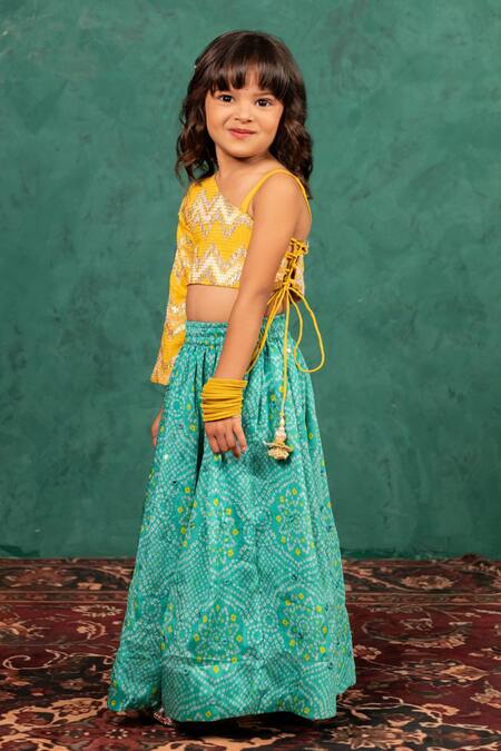 JILMIL DREAMWEAR Yellow Brocade Tassels Bandhani Top And Lehenga Set Online at Aza Fashions JILMIL DREAMWEAR_Yellow Brocade Tassels Bandhani Top And Lehenga Set _Online_at_Aza_Fashions