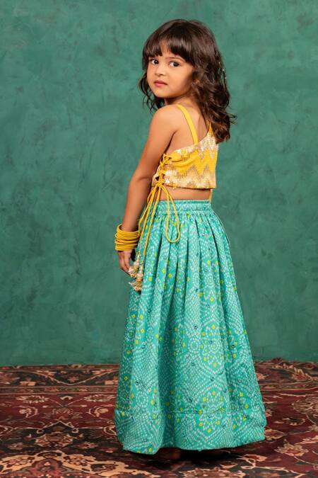 Buy JILMIL DREAMWEAR Yellow Brocade Tassels Bandhani Top And Lehenga Set Online at Aza Fashions Buy_JILMIL DREAMWEAR_Yellow Brocade Tassels Bandhani Top And Lehenga Set _Online_at_Aza_Fashions