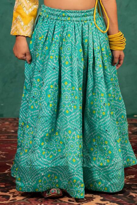 JILMIL DREAMWEAR Yellow Brocade Tassels Bandhani Top And Lehenga Set at Aza Fashions JILMIL DREAMWEAR_Yellow Brocade Tassels Bandhani Top And Lehenga Set _at_Aza_Fashions