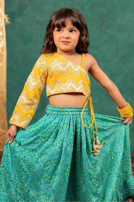 Buy JILMIL DREAMWEAR Yellow Brocade Tassels Bandhani Top And Lehenga Set Buy_JILMIL DREAMWEAR_Yellow Brocade Tassels Bandhani Top And Lehenga Set