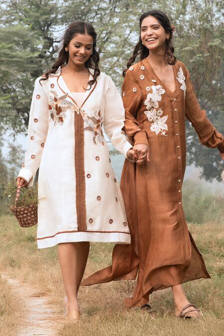 Kushani_Ivory Linen, Silk, Cotton Beads, Embroidery Notched Neck Midi Dress _Online_at_Aza_Fashions