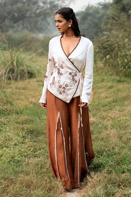 Shop Kushani Ivory Satin, Linen Embroidery V-neck Wrap Top And Mocha Brown Trousers Online at Aza Fashions Shop_Kushani_Ivory Satin, Linen Embroidery V-neck Wrap Top And Mocha Brown Trousers _Online_at_Aza_Fashions