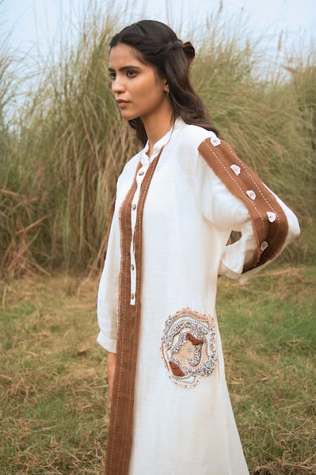 Kushani_Ivory Linen, Silk Beads, Tassels Button-down Neck Harmony Whispers Dress _Online_at_Aza_Fashions