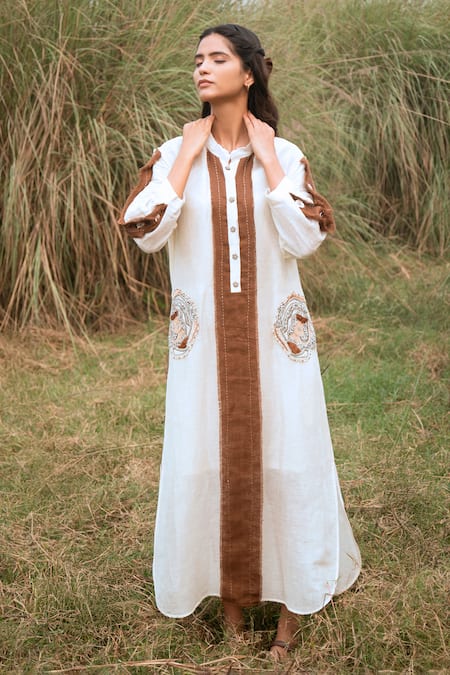 Shop_Kushani_Ivory Linen, Silk Beads, Tassels Button-down Neck Harmony Whispers Dress _Online_at_Aza_Fashions