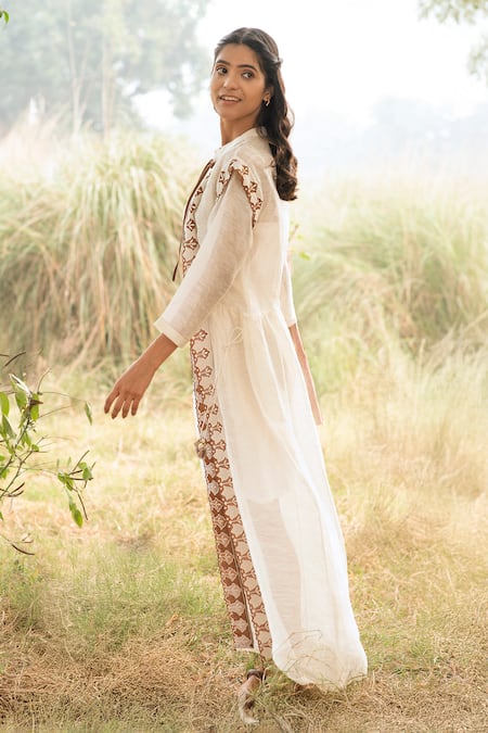 Buy_Kushani_Ivory Linen, Silk Beads, Tassels Open Neck Embroidered Dress _Online_at_Aza_Fashions