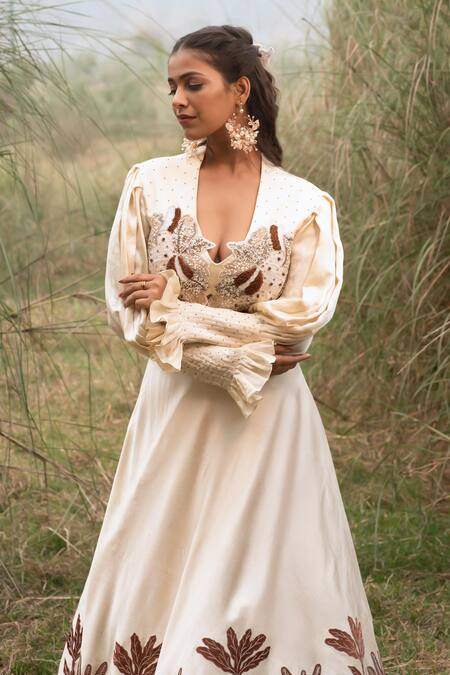 Buy_Kushani_Ivory Satin, Linen Tassels, Beads Round Neck Floral Serenity Lehenga Set _Online_at_Aza_Fashions