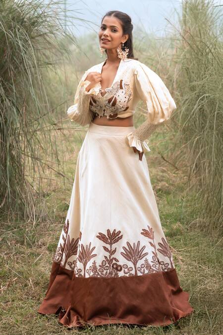 Buy_Kushani_Ivory Satin, Linen Tassels, Beads Round Neck Floral Serenity Lehenga Set 