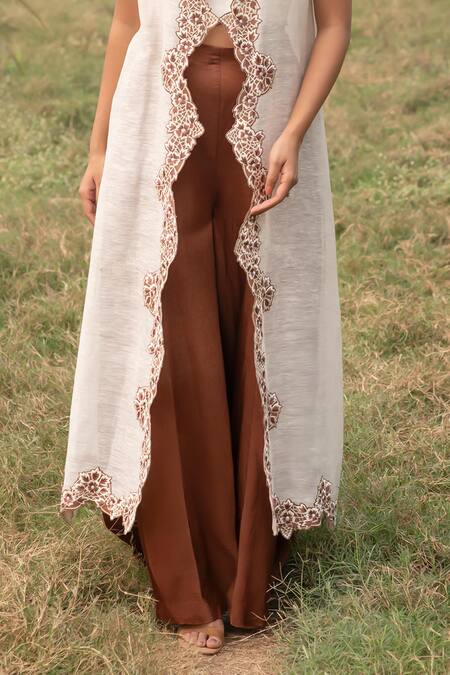 Shop_Kushani_Ivory Linen, Silk, Satin Beads, Embroidery Round Cape And Mocha Brown Trouser Set _Online_at_Aza_Fashions