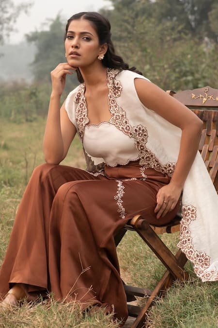 Kushani_Ivory Linen, Silk, Satin Beads, Embroidery Round Cape And Mocha Brown Trouser Set _at_Aza_Fashions