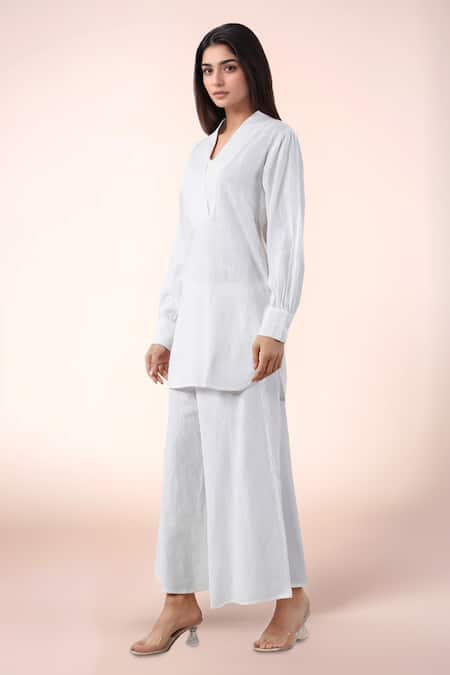 Buy Naintara Bajaj White Cotton Split V-neck Kurta And Pant Set Online at Aza Fashions Buy_Naintara Bajaj_White Cotton Split V-neck Kurta And Pant Set _Online_at_Aza_Fashions