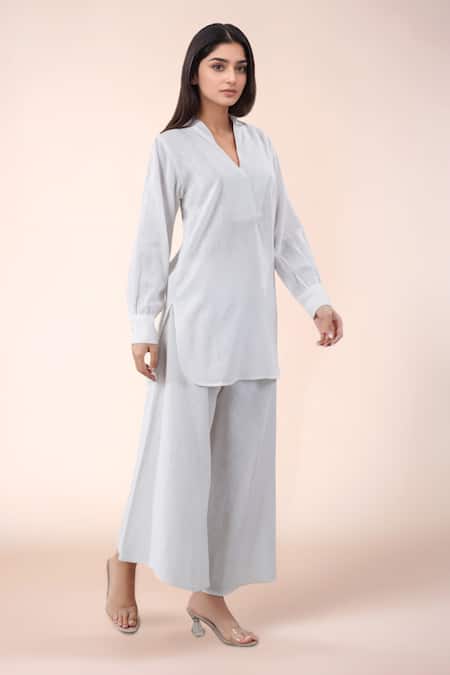Shop Naintara Bajaj White Cotton Split V-neck Kurta And Pant Set Online at Aza Fashions Shop_Naintara Bajaj_White Cotton Split V-neck Kurta And Pant Set _Online_at_Aza_Fashions