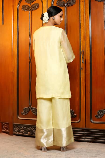 Shop Eeda Yellow Silk Organza, Shantoon V-neck Lemon Kurta Pant Set at Aza Fashions Shop_Eeda_Yellow Silk Organza, Shantoon V-neck Lemon Kurta Pant Set _at_Aza_Fashions