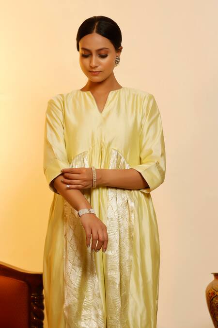 Eeda Yellow Chinon, Shantoon Round Neck Lemon Chiniya Silk Anarkali Online at Aza Fashions Eeda_Yellow Chinon, Shantoon Round Neck Lemon Chiniya Silk Anarkali _Online_at_Aza_Fashions