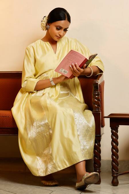 Eeda Yellow Chinon, Shantoon Round Neck Lemon Chiniya Silk Anarkali at Aza Fashions Eeda_Yellow Chinon, Shantoon Round Neck Lemon Chiniya Silk Anarkali _at_Aza_Fashions