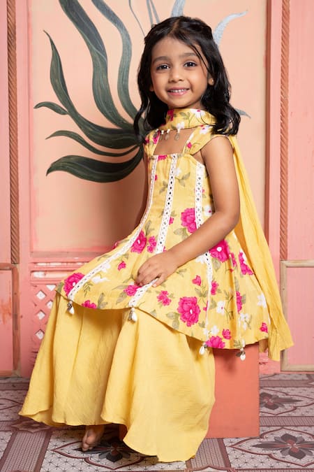 Buy_Kirti Agarwal - Pret N Couture_Yellow Linen Pom-poms, Tassels Floral Print Kurta Palazzo Set _Online_at_Aza_Fashions