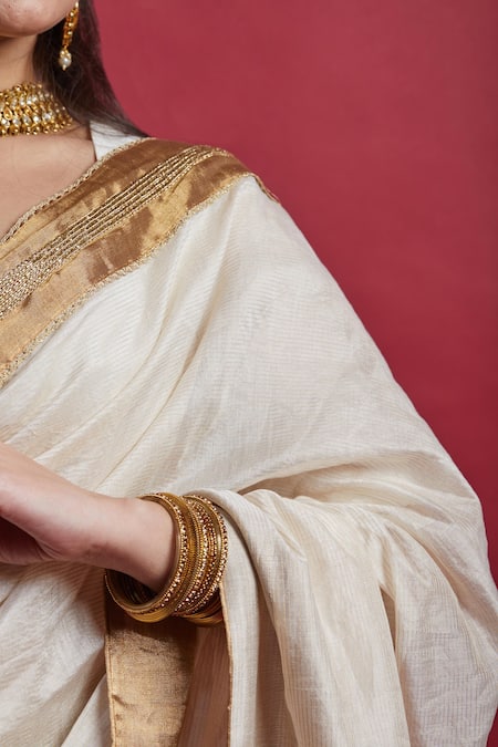 Shop Vinusto Ivory Chanderi Embroidery, Zari Round Neck And Gold Saree Set Online at Aza Fashions Shop_Vinusto_Ivory Chanderi Embroidery, Zari Round Neck And Gold Saree Set _Online_at_Aza_Fashions