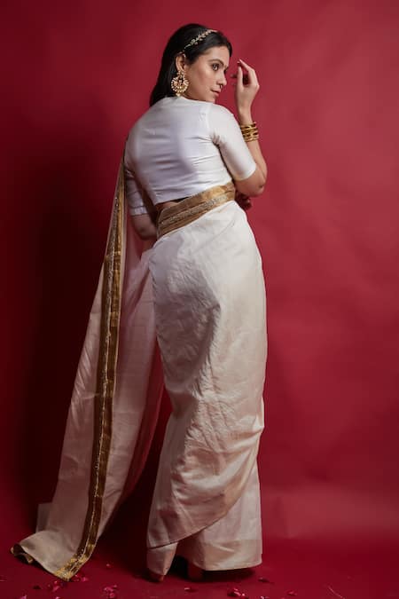 Shop Vinusto Ivory Chanderi Cut Work And Gold Saree With Unstitched Blouse Piece at Aza Fashions Shop_Vinusto_Ivory Chanderi Cut Work And Gold Saree With Unstitched Blouse Piece _at_Aza_Fashions