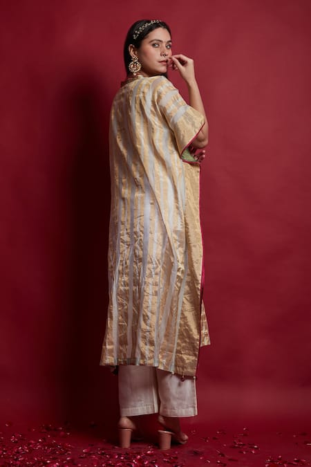 Shop Vinusto Ivory Chanderi Tassels, Embroidery V-neck Gold Zari Stripe Kaftan And Pants Set at Aza Fashions Shop_Vinusto_Ivory Chanderi Tassels, Embroidery V-neck Gold Zari Stripe Kaftan And Pants Set _at_Aza_Fashions