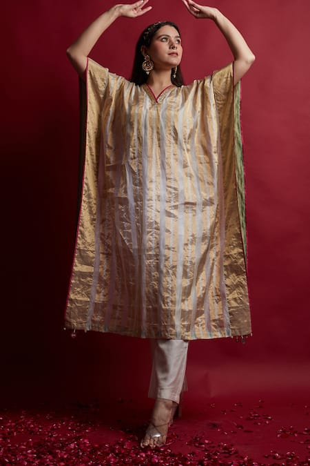 Shop Vinusto Ivory Chanderi Tassels, Embroidery V-neck Gold Zari Stripe Kaftan And Pants Set Online at Aza Fashions Shop_Vinusto_Ivory Chanderi Tassels, Embroidery V-neck Gold Zari Stripe Kaftan And Pants Set _Online_at_Aza_Fashions