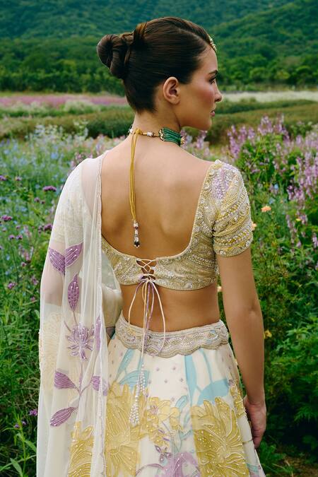 Buy_Charu And Vasundhara_Ivory Organza, Taffeta, Net Beads, Sequins, Embroidery Round Floral Lehenga Set _Online_at_Aza_Fashions
